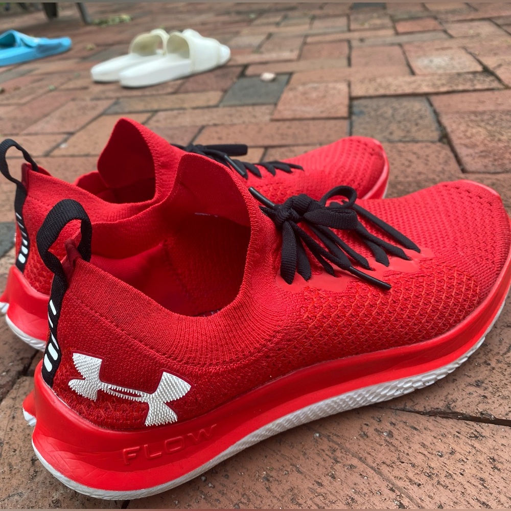 Red adidas running sneakers